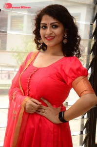 Model turned Actress Sai Keerthana Swargam in Red Salwar Kameez posing for a photoshoot