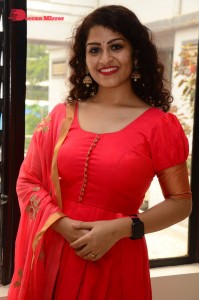 Model turned Actress Sai Keerthana Swargam in Red Salwar Kameez posing for a photoshoot