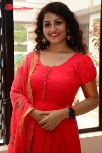 Model turned Actress Sai Keerthana Swargam in Red Salwar Kameez posing for a photoshoot