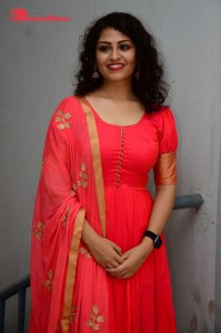 Model turned Actress Sai Keerthana Swargam in Red Salwar Kameez posing for a photoshoot