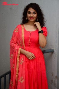 Model turned Actress Sai Keerthana Swargam in Red Salwar Kameez posing for a photoshoot