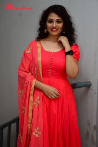 Model turned Actress Sai Keerthana Swargam in Red Salwar Kameez posing for a photoshoot