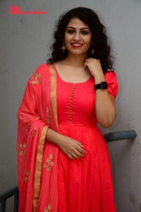 Model turned Actress Sai Keerthana Swargam in Red Salwar Kameez posing for a photoshoot