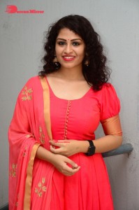 Model turned Actress Sai Keerthana Swargam in Red Salwar Kameez posing for a photoshoot