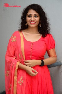 Model turned Actress Sai Keerthana Swargam in Red Salwar Kameez posing for a photoshoot