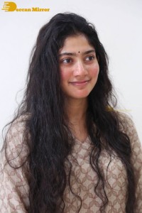 Actress Sai Pallavi fun expressions during a photoshoot