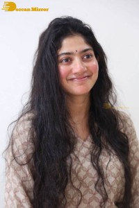 Actress Sai Pallavi fun expressions during a photoshoot
