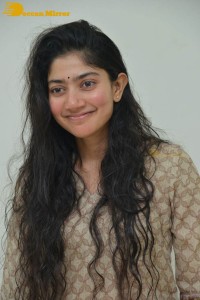 Actress Sai Pallavi fun expressions during a photoshoot