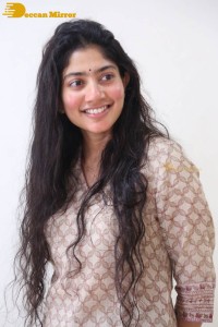 Actress Sai Pallavi fun expressions during a photoshoot