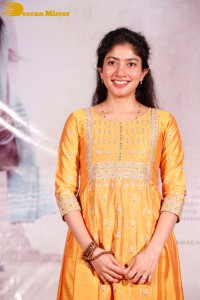 Actress Sai Pallavi in a yellow salwar kameez dress
