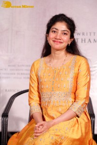 Actress Sai Pallavi in a yellow salwar kameez dress