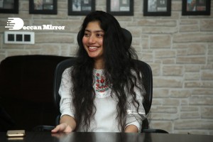 Actress Sai Pallavi in white top and blue jeans