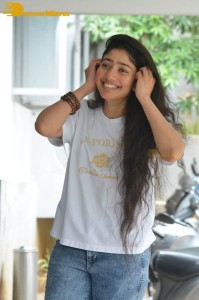 Telugu and Tamil Actress Sai Pallavi photoshoot in a white t-shirt and blue denim jeans