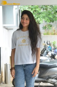 Telugu and Tamil Actress Sai Pallavi photoshoot in a white t-shirt and blue denim jeans