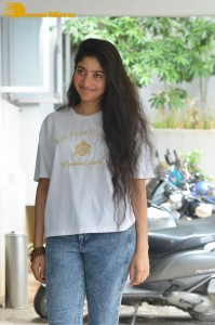 Telugu and Tamil Actress Sai Pallavi photoshoot in a white t-shirt and blue denim jeans
