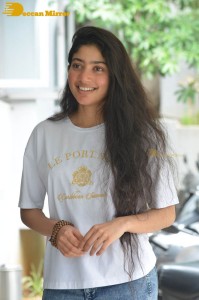 Telugu and Tamil Actress Sai Pallavi photoshoot in a white t-shirt and blue denim jeans