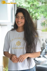 Telugu and Tamil Actress Sai Pallavi photoshoot in a white t-shirt and blue denim jeans