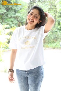 Telugu and Tamil Actress Sai Pallavi photoshoot in a white t-shirt and blue denim jeans