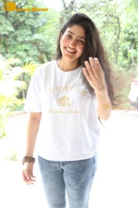 Telugu and Tamil Actress Sai Pallavi photoshoot in a white t-shirt and blue denim jeans
