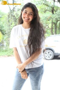 Telugu and Tamil Actress Sai Pallavi photoshoot in a white t-shirt and blue denim jeans