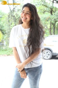 Telugu and Tamil Actress Sai Pallavi photoshoot in a white t-shirt and blue denim jeans