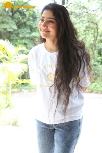 Telugu and Tamil Actress Sai Pallavi photoshoot in a white t-shirt and blue denim jeans