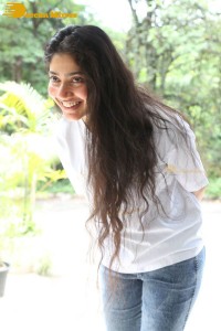 Telugu and Tamil Actress Sai Pallavi photoshoot in a white t-shirt and blue denim jeans