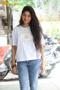 Telugu and Tamil Actress Sai Pallavi photoshoot in a white t-shirt and blue denim jeans