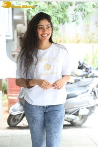 Telugu and Tamil Actress Sai Pallavi photoshoot in a white t-shirt and blue denim jeans