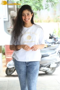 Telugu and Tamil Actress Sai Pallavi photoshoot in a white t-shirt and blue denim jeans