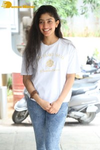 Telugu and Tamil Actress Sai Pallavi photoshoot in a white t-shirt and blue denim jeans