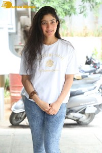 Telugu and Tamil Actress Sai Pallavi photoshoot in a white t-shirt and blue denim jeans