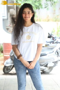 Telugu and Tamil Actress Sai Pallavi photoshoot in a white t-shirt and blue denim jeans