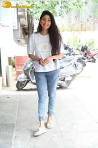 Telugu and Tamil Actress Sai Pallavi photoshoot in a white t-shirt and blue denim jeans