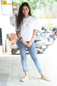 Telugu and Tamil Actress Sai Pallavi photoshoot in a white t-shirt and blue denim jeans