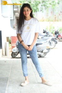 Telugu and Tamil Actress Sai Pallavi photoshoot in a white t-shirt and blue denim jeans
