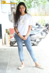 Telugu and Tamil Actress Sai Pallavi photoshoot in a white t-shirt and blue denim jeans
