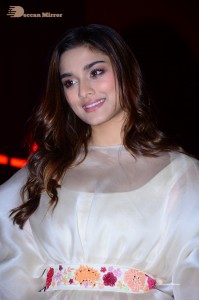 Actress Saiee Manjrekar dressed in white while attending a movie event