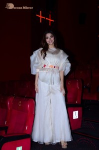 Actress Saiee Manjrekar dressed in white while attending a movie event