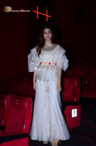Actress Saiee Manjrekar dressed in white while attending a movie event