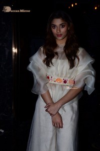 Actress Saiee Manjrekar dressed in white while attending a movie event
