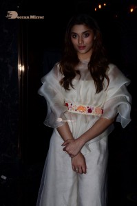 Actress Saiee Manjrekar dressed in white while attending a movie event