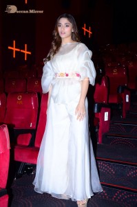 Actress Saiee Manjrekar dressed in white while attending a movie event