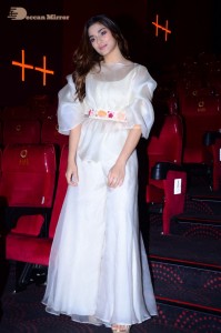 Actress Saiee Manjrekar dressed in white while attending a movie event