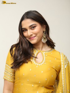 actress Saiee Manjrekar sexy looks in a yellow salwar dress
