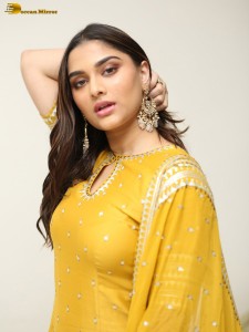actress Saiee Manjrekar sexy looks in a yellow salwar dress