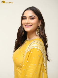 actress Saiee Manjrekar sexy looks in a yellow salwar dress