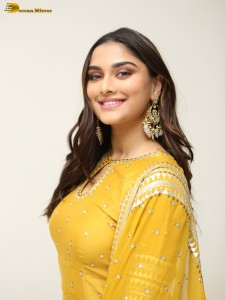 actress Saiee Manjrekar sexy looks in a yellow salwar dress