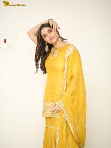 actress Saiee Manjrekar sexy looks in a yellow salwar dress