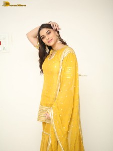 actress Saiee Manjrekar sexy looks in a yellow salwar dress